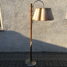 a lamp that is sitting on the ground