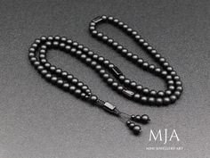 other designs www.etsy.com/shop/minejewelleryart The Mala 33 Inc  The mala in the picture has been made as 33 inches (108 beads). Different measurements are achieved by reducing the onyx beads in the front section of the mala.  The handmade necklace is made of 8,6,4 mm black onyx beads, and Ruby Zoisite, Amethyst, Or Tourmaline stones. All finished with nylon cord.  The products are custom-made and done of their kind. They can be differentiated at the minimum level from the photographs (in color Onyx Black Beads For Gifts, Handmade Black Mala As Gift, Onyx Beaded Necklaces With 8mm Beads As Gift, Onyx Beaded Necklaces With Round Beads For Gifts, Onyx Beaded Necklace With Round Beads As Gift, Onyx 8mm Beaded Necklaces For Jewelry Making, Black Beaded Mala As A Gift, Black Beaded Mala As Gift, Onyx Beads 8mm As A Gift