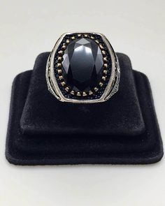 This is beautiful Black Agate ring with sterling silver caring crown designed by Turkish. Good pre-own condition,  this ring is the perfect example of authentic.  Ring Size: US 10.25 ;    Stone surface size: 3/4" (H) x 9/16" (W) (1.9 cm x 1.4 cm) Weight: 19 grams   Item is exactly as shown in pictures.   Please carefully review the item description and accompanying pictures before making a purchase, as we do not offer a return or exchange policy. If you have any questions or require assistance, please do not hesitate to reach out to us.   Check my store link to find more treasures:   https://galaxysilvercity.etsy.com Black Agate Ring, Stone Surface, Crown Design, Men Ring, Silver Jewelry Rings, Agate Ring, Black Agate, Ring Jewelry, Rings Statement