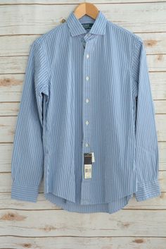 NWT Polo Ralph Lauren - Blue white striped COTTON button dress shirt, size S -Description- Polo Ralph Lauren - Blue white striped COTTON button dress shirt Material(s): 100% Cotton Size: S Condition: New with tags! -Measurements- Across Chest to Underarm Seams: 21” Length from Shoulder to Hem: 29” Sleeve from Underarm: 21” Sleeve from Shoulder: 25”  _gsrx_vers_856 (GS 7.0.20 (856)) Spring Business Pinstripe Dress Shirt, Striped Dress Shirt For Business Casual In Spring, Spring Striped Dress Shirt For Business Casual, Striped Semi-formal Spring Dress Shirt, Semi-formal Striped Cotton Dress Shirt, Button Dress, Dress Shirt, Polo Ralph, Blue White