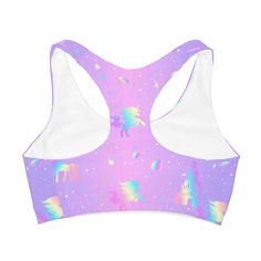 Crafted from a soft, lightweight double-lined fabric, this racerback sports bra is designed with comfort and adjustability in mind; the elastic band allows the wearer to fit the garment exactly to their body shape while remaining seamless and non-abrasive during physical exertion. Elegantly adorned with an enchanting all-over Pastel Unicorn Fairytale print, this is an ideal choice for any active girl. : Material: 82% polyester, 18% spandex .: Medium fabric (7.5 oz /yd²).: Runs true to size.: Rac Breathable Racerback Crop Top For Light Exercise, Breathable Racerback Bra For Light Exercise, High Stretch Racerback Bra For Light Exercise, Seamless Gym Bra, Pink Racerback Bra For Yoga, Pink Racerback Yoga Bra, Breathable Racerback Crop Top For Light Sports, Breathable Medium Support Racerback Bra, Breathable Racerback Bra With Medium Support