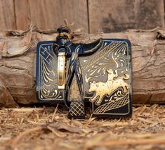 "Enamel black & gold colored hand engraved horse saddle belt buckle -measures 3 1/2\" x 5\"" Western Gold Belt With Antique Buckle, Western Style Black Belt For Western-themed Events, Western Black Belt Buckles For Rodeo, Gold Western Belt For Western-themed Events, Western Style Gold Belts For Western-themed Events, Engraved Western Belt Buckles For Rodeo, Black Concho Belt Buckles For Ranch, Black Belt With Antique Buckle For Rodeo, Black Concho Belt Buckles