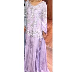 Comes With Extra Trousers, Gharara, Dupta And Top. Embroidery In Front And Back With Full Pearl On Duptta And Gharara. Perfect Wedding Guest Outfit. Purple Long Sleeve Sharara With Intricate Embroidery, Floor-length Chinon Sharara With Chikankari Embroidery, Party Sharara With Chikankari For Diwali, Party Diwali Sharara With Chikankari Embroidery, Diwali Party Chikankari Embroidery Sharara, Party Diwali Chikankari Embroidery Sharara, Floor-length Organza Sharara With Chikankari Embroidery, Party Sharara With Chikankari Embroidery In Traditional Drape, Party Sharara With Chikankari Embroidery