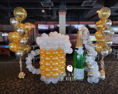 balloons and champagne are on display at an event