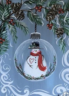 a snowman ornament hanging from a christmas tree