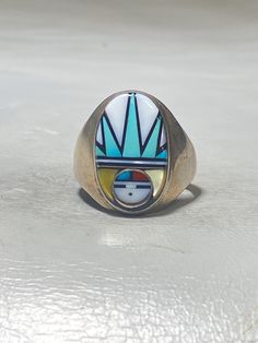 "Sun ring Zuni turquoise coral southwest MOP Mother of Pearl sterling silver women Size 11.25 Weight 13.9g Length 7/8\" Width 1/2\" Band width back of band 3/16\" Free Shipping & Free Postal Insurance Delivered in a Gift Box If you do not want the ring polished and want to leave the natural patina please let me know at the time of purchase as I do polish rings before I ship rings out. Thanks Free First Class shipping and postal insurance is included. If you want to upgrade to priority kindly Southwestern Polished Turquoise Ring Collectible, Multicolor Southwestern Sterling Silver Turquoise Ring, Southwestern Sterling Silver Opal Ring, Multicolor Southwestern Style Turquoise Ring In Sterling Silver, Multicolor Southwestern Turquoise Sterling Silver Ring, Southwestern Multicolor Turquoise Sterling Silver Ring, Sun Ring, Spoon Rings, Coral Turquoise