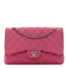 This is an authentic CHANEL Iridescent Caviar Quilted Jumbo Double Flap in Pink. This classic flap bag is crafted of tonal pink suede like caviar leather. The bag features a silver chain-link shoulder strap threaded with leather, a crossover flap, and a silver Chanel CC turn-lock on the front.  The flap opens to matching leather interior with patch pockets. Pink Evening Bag With Double Flap, Pink Double Flap Bag For Evening, Pink Double Flap Evening Bag, Designer Pink Bag With Magnetic Closure, Luxury Pink Bag With Magnetic Closure, Designer Pink Bags With Magnetic Closure, Luxury Pink Bags With Magnetic Closure, Classic Pink Bag With Magnetic Closure, Formal Pink Flap Bag