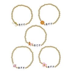 The perfect "Wear-One-Share-One" gift for friends! These cute bracelets are perfect for sharing with best friends and favorite people. This fun set of BFF bracelets by Wonder Nation celebrates the unique bond between friends and family and includes five stretch bracelets featuring goldtone beads, and colorful charms in fun motifs that girls love  flowers, rainbows, butterflies and "BFF" ID letter beads. Makes a great gift or a fun party favor. Size: one size.  Color: Metal Type.  Gender: female. Bff Bracelets For 5 Bffs, Friendship Brackets With Beads, Friendship Brackets, Bff Stuff, Bracelets For Girls, Bff Bracelets, Between Friends, Letter Beads, Cute Bracelets