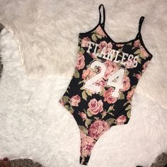 Floral Flawless Bodysuit Nwt Summer Printed Bodysuit For Loungewear, Printed Summer Bodysuit For Loungewear, Summer Printed Loungewear Bodysuit, Casual Printed Bodysuit For Loungewear, Trendy Sleeveless Printed Bodysuit, Trendy Printed Sleeveless Bodysuit, Black Summer Bodysuit For Loungewear, Casual Bodysuit With Letter Print For Loungewear, Casual Letter Print Bodysuit For Loungewear