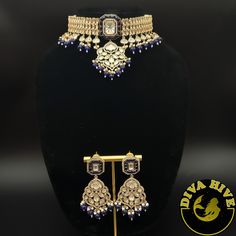 Beautiful silver foil kundan Choker with carved stones. Elevate your style with the exquisite Diva necklace and earring set, exclusively available at our luxury Indian jewelry store. Made with the finest materials, this set is a true reflection of Elegance and glamour, designed to take your look to new heights. Each piece in the set is meticulously crafted to ensure superior quality and attention to detail. The necklace and earring set is the perfect addition to your collection offering versatil Luxury Kundan Jewelry With Stone Work, Elegant Kundan Sets With Meenakari Detailing, Luxury Kundan Chandbali Jewelry, Luxury Stone Work Jewelry Sets For Festive Occasion, Luxury Gold Jewelry Sets With Stone Work, Luxury Kundan Meenakari Necklace For Festive Occasions, Luxury Kundan Necklace With Meenakari For Festive Occasions, Luxury Meenakari Kundan Necklace For Festive Occasions, Luxury Meenakari Chandbali Jewelry