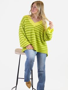 Give the gift of cozy warmth in this fabulous sweater. It has a hi-lo effect that adds interest and style to any outfit. Made from super soft, stretchy fabric that hugs your curves in all the right places, this sweater is sure to be a favorite! Stripe pull over V neck sweater Heavy weight Fuzzy fabric Hi-Lo effect Drop shoulders Super soft and stretchy Fuzzy Fabric, Maggie Mae, All The Right Places, Hug You, V Neck Sweater, The Gift, Stretchy Fabric, Heavy Weight, Vneck Sweater