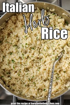 a pan filled with rice on top of a stove