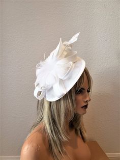 Classy white thick linen fascinator with binding feather flower and duck spike The hat sits on a matching satin headband or clip both included. You will receive in the mail 4-5 business days after purchase. White Adjustable Headpiece With Short Brim, White Formal Costume Hats And Headpieces For Spring, White Mini Hat For Formal Spring Occasions, Formal Fitted White Headband, White Formal Costume Hats For Spring, Formal White Mini Hat For Spring, Spring Formal White Mini Hat, Classic White Mini Hat With Short Brim, White Formal Headband For Summer