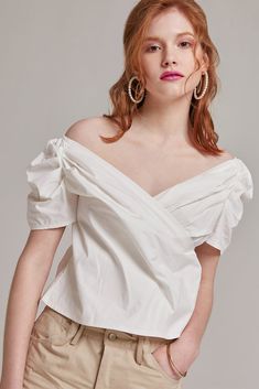 Trendy V-neck Top With Twist Front, V-neck Twist Front Top For Day Out, Twist Front V-neck Top For Day Out, Chic Solid Surplice Neckline Tops, Chic Surplice Neckline Tops, Spring V-neck Wrap Top In Solid Color, Ruched Short Sleeve Tops For Work, Elegant Wrap Top In Solid Color, Elegant Wrap Top