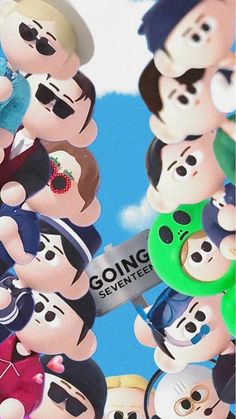 a group of cartoon characters holding a green object in front of a blue sky with clouds