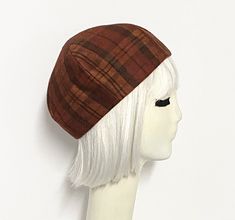 "Rust plaid vintage upcycled wool blend beret hat, lined in rayon print, the top of the hat is made up of 6 section crown, wool bias 1\" fitted band and !' soft elastic band inside. One size fits most up to a 22\" head size Made in the USA Machine wash cold / hand dry" Fitted Fall Cap, Classic Fitted Cloche Cap, Adjustable Plaid Flat Cap, Retro Fall Hats One Size, Retro Fall Hat One Size, Retro One Size Hats For Fall, Fitted Wool Beret With Short Brim, Adjustable Wool Beret For Fall, Vintage Fitted Beanie Hat