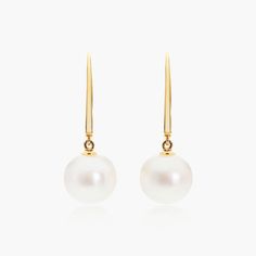 14K Yellow Gold Freshwater Cultured Pearl Leverback Earrings. These gorgeous earrings will have you feeling like a princess everyday. Casual enough for daily wear and formal enough for a black tie wedding, these earrings make the perfect gift! Refined 14k Gold Earrings For Formal Occasions, Classic Bridal Earrings With Elegant Design For Evening, Classic Yellow Gold Earrings For Formal Occasions, Timeless Elegant Bridal Earrings For Formal Occasion, Classic Elegant Bridal Earrings For Evening, Classic Elegant Design Bridal Earrings For Evening, Elegant Akoya Pearl Earrings For Anniversary, Classic Pearl Earrings With French Hook For Anniversary, Timeless Yellow Gold Drop Bridal Earrings