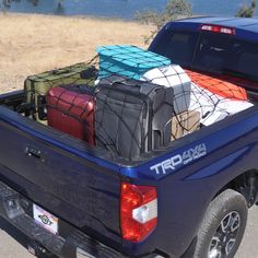 the truck is loaded with luggage and ready to go out on the road in the day