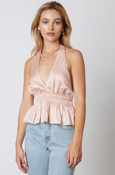 The Kinda Flirty Blush Satin Halter Top is an important addition piece to your wardrobe! Silky satin fabric shapes this sexy halter top that has a tying halter neckline that flows into a sleeveless plunge neck bodice with an open-back design. Attached stretchy smocked waist and ruffle hem finish the look. Cute Blush, Boho Boutique, Backless Top, Pink Boho, Satin Top, Dressy Tops, Halter Neckline, Boho Chic Fashion, Ruffle Hem