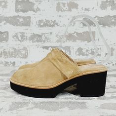 New Toe Shape Round Toe Closure Slip On Us Shoe Size 5 Occasion Casual, Workwear Platform Height .75 In Heel Height Mid (2-2.9 In) Department Women Outsole Material Rubber Style Mule Features Comfort, Cushioned Season Fall, Spring, Summer, Winter Pattern Solid Lining Material Suede Color Beige, Black Brand Eileen Fisher Type Heel Heel Style Block Model Eileen Fisher Hiya Shoe Width Standard Upper Material Suede Insole Material Leather Spring Mules With Rubber Sole And Medium Width, Spring Mules With Rubber Wedge Heel, Suede Closed Toe Platform Clogs, Beige Slip-on Closed Toe Clogs, Suede Platform Mules With Round Toe, Spring Wedge Heel Clogs With Leather Sole, Spring Leather Sole Wedge Heel Clogs, Spring Suede Wedge Heel Clogs, Spring Suede Clogs With Wedge Heel