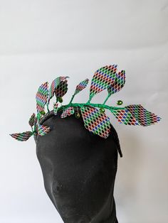 African print leaf crown with crystal gemstones  headpiece attached to an alice band. Green Crown, Mini Hats, Leaf Crown, Wedding Fascinators, Alice Band, Wedding Hair Accessories, Crystals And Gemstones, African Print, Fascinator