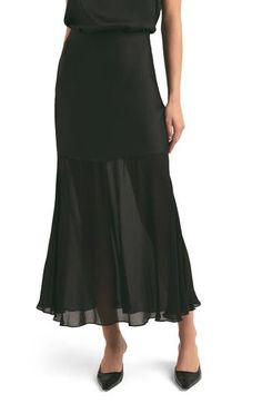 Every closet craves this elevated maxi skirt punctuated with a semi-sheer chiffon hem. 100% polyester Dry clean Imported Black Flowy Skirt, Sheer Maxi Skirt, Black Maxi Skirt, Sheer Skirt, Concert Fits, Favorite Daughter, Sheer Chiffon, Black Maxi, Flowy Skirt