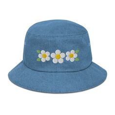 Puff Embroidered Three Daisy Denim Bucket Hat with white and yellow daisies. 100% Cotton. Poplin sweatband absorbs sweat. Practical, comfortable and fashionable hat. One size fits most. Gift for nature lovers, gardening, sun protection hat, and beach hat. Birthday gifts for women and gardeners. Made to order, ships in 2-7 days. Click and Order today to wear this springtime and summertime! Here's an accessory that'll become your main outfit piece. Get yourself this trendy, comfortable, and versatile bucket hat that'll work for all kinds of outfits--casual, sporty, and streetwear. * 100% cotton * 2 sewn eyelets on each side of the hat * Poplin sweatband * One size fits most * Blank product sourced from China For other daisy hats and gifts click here: https://www.etsy.com/shop/KristinCooperDe Casual Flower-shaped Sun Hat For Summer, Casual Flower Shaped Sun Hat For Summer, Casual Summer Sun Hat With Flower Shape, Denim Bucket Hat For Spring, Spring Denim Bucket Hat With Short Brim, Casual Flower-shaped Sun Hat For Spring, Casual Flower Shaped Sun Hat For Spring, Casual Summer Denim Sun Hat, Casual Denim Sun Hat For Summer