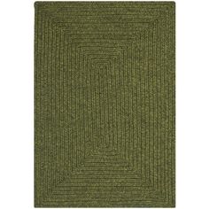 a green rug with an interlocked design