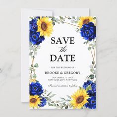 save the date card with sunflowers, blue roses and greenery on it