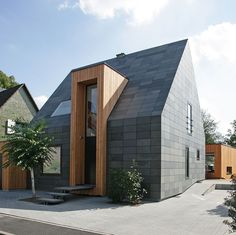 the house is made out of concrete and wood