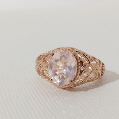 This Is A Charming Delicately Designed Ring. The Genuine Rose Quartz Ring Is 14k Rose Gold Over Sterling Silver. The 8x10 Mm Faceted Rose Quartz Gemstone Is 2.2 Carats. The Ring Setting Is Intricately Detailed. This Beautiful Ring Is A Wonderful Addition To Your Collection. New Without Tags In Gift Box. Rose Quartz Ring, Rose Quartz Gemstone, Ring Color, Ring Setting, Quartz Ring, Beautiful Ring, 2 Carat, Womens Jewelry Rings, Ring Sets