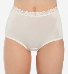 Front Elegant Solid Bottoms With Contoured Waistband, Classic Fitted Nylon Bottoms, Fitted Classic Nylon Bottoms, Elegant High-waist Nylon Bottoms, Elegant High Waist Nylon Bottoms, Elegant Nylon Bottoms With High-cut Leg, Elegant Beige Smoothing Bottoms, Elegant Short Length Beige Shapewear, Elegant Beige Short Length Shapewear