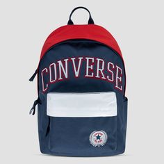 Carry your stuff in All Star style with this backpack from Converse. It's made of durable poly fabric with colorblocked detailing and features a varsity style applique patch as well as the Chuck Patch logo. The main compartment has a 2-way zip closure and is spacious enough to hold text books, a change of clothes, your lunch or any other items you want to take along for the day. One the back there is a zippered padded compartment that can be used to store your laptop or tablet and the front zip pocket can be used to secure smaller items you want quick and easy access to. Use the bottle pockets to hold your beverages and adjust the padded straps for comfy wear. Casual School Backpack With Logo Patch, Back To School Standard Backpack With Logo Patch, Casual Blue Bag With Logo Patch, Casual Blue Bags With Logo Patch, Casual Backpack With Embroidered Logo, Sporty School Backpack For Back To School, Sporty Backpack For Back To School, Navy Backpack For Students Back To School, School Backpack With Logo Patch