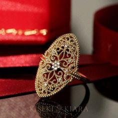 18k Solid Gold Byzantine Queen Vintage Ring, Floral Lace Design Antique Victorian Rings, Retro Promise Rings, Edwardian Anniversary Rings DETAILS ♡⃛ ⃛ Main stone: Moissanite Side stone: - Band width: 1.6mm Band thickness: 1.2mm OUR GEMSTONES ♡⃛ ⃛ At Kiseki Kiara, we use both precious and semi-precious stones throughout our jewelry designs, with each stone set-by-hand in our workshop. We carefully source gemstones for their quality and color ensuring you receive the best quality stones. All our w 14k Gold Jewelry With Intricate Design For Marriage, Traditional Yellow Gold Filigree Ring For Formal Events, Traditional Yellow Gold Filigree Ring For Formal Occasions, Gold Filigree Open Ring For Anniversary, Traditional Yellow Gold Diamond Ring For Anniversary, Elegant Hand Set Oval Diamond Ring, 14k Gold Byzantine Style Round Rings, Formal Hand Set Yellow Gold Rings, 14k Gold Byzantine Style Rings