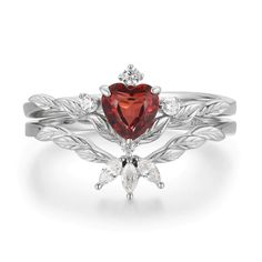 Radiating warmth and love is our Flaming Heart Red Garnet Ring Set© that unveils a heart-shaped red garnet gem at the center of a silver leaf patterned band with a matching topaz stacking ring to add a perfect splendor. A glimmering set that serves as a beautiful reminder to know your worth, spread love, and make a difference. It is also a perfect and timeless symbol of love with a promise to stay forever. ✦ Available in both 14K white gold vermeil (14K white gold plated over a sterling silver b Dnd Wedding, Bff Rings, Flaming Heart, Red Garnet Ring, Stay Forever, Know Your Worth, Timeless Symbol, Garnet Gem, Gold Vermeil Jewelry