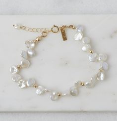 Adjustable Bracelet With Pearl Charm, Chic Adjustable Jewelry With Pearl Charm, Chic Adjustable Pearl Charm Jewelry, Handmade Chic Bracelet Jewelry, Everyday Single Strand Bracelet Jewelry, Elegant Beaded Chain Bracelet For Everyday, Elegant Everyday Beaded Chain Bracelet, Luxury Single Strand Bracelet As Gift, Chic Adjustable Pearl Bracelet With Pearl Charm