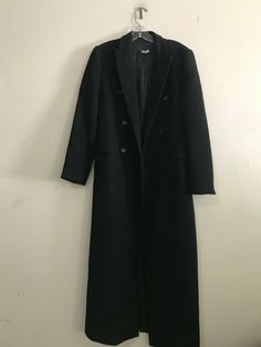 Zara Size 6  Wool Black Long Duster Double Button Coat Jacket Women Winter Measurements: Chest 19 inches arm pit to armpit Length 51 inches shoulder to hemShoulder to Wrist 29 inches Shoulder hem to Wrist 24 inches 80% wool 20% nylon Lining 100% rayon RN# 77302 Black Long Coat Outerwear With Buttons, Black Long Coat With Buttons, Classic Winter Outerwear With Snap Buttons, Black Long Coat With Button Closure, Classic Long Winter Blazer, Formal Winter Button-up Pea Coat, Formal Button-up Pea Coat For Winter, Black Pea Coat With Double Button Closure, Black Double-breasted Outerwear With Button Closure