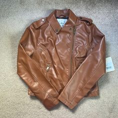 Purchased From Nordstrom Faux Leather Moto Jacket Size Large Nwt Color Cognac Monochrome Faux Leather Biker Jacket For Fall, Faux Leather Jacket For Fall, Brown Faux Leather Biker Jacket For Winter, Trendy Brown Faux Leather Biker Jacket, Trendy Brown Biker Jacket With Zipper Closure, Trendy Brown Biker Jacket With Zipper, Brown Biker Outerwear For Fall, Brown Faux Leather Jacket For Fall, Brown Faux Leather Outerwear For Fall