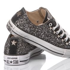 Converse All Star Glitter Black Ox, a women's trainer with an all-new, distinctive look. Covered in black glitter on both sides and finished with studs between the eyelets, so that your feet sparkle with every step. The Converse All Star Glitter Black Ox will come with its original white laces. Converse Glitter, Glitter Converse, Black Glitter, Converse All Star, Custom Shoes, Ox, Trainers Women, Luxury Retail, Luxury Boutique