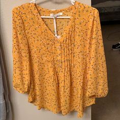 Never Worn! Yellow V-neck Blouse For Fall, Yellow Floral Print Blouse For Work, Yellow Flowy Casual Blouse, Casual Flowy Yellow Blouse, Flowy Yellow Casual Blouse, Flowy Yellow Blouse For Fall, Yellow V-neck Blouse For Spring, Yellow Floral Print Blouse For Day Out, Yellow Flowy Blouse For Spring