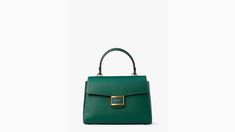 Our Katy bag gets a new look with a polished top-handle design. Done in textured leather it's the go-to bag for days when you want to feel perfectly put together. | Kate Spade Katy Medium Top-Handle Bag, Arugula Classic Medium Leather Bag, Classic Green Bag With Detachable Handle, Modern Medium Bags With Detachable Handle, Modern Medium Bag With Detachable Handle, Elegant Green Satchel For Work, Green Leather Flap Bag With Top Carry Handle, Chic Bags With Top Handle And Magnetic Closure, Chic Top Handle Bag With Magnetic Closure, Luxury Medium Shoulder Bag With Detachable Handle