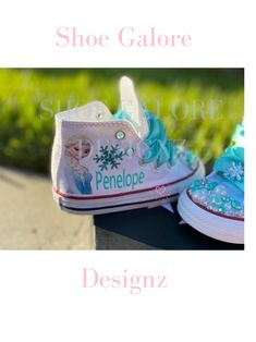 Step into a winter wonderland of style with our enchanting Elsa-inspired Converse sneakers! These handcrafted shoes are meticulously designed to capture the elegance and magic of the beloved character, featuring intricate snowflake patterns, shimmering accents, and icy blue hues that are sure to turn heads. Each pair is carefully customized to infuse your everyday style with a touch of Frozen fantasy. Don't miss out on the opportunity to let your inner ice queen shine with our captivating Elsa-inspired Converse sneakers! Intricate Snowflake, Baskets Converse, Snowflake Patterns, High Top Converse, Ice Queen, Icy Blue, Snowflake Pattern, Converse Sneakers, Converse High Tops