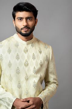 Mint green self-textured sherwani with floral embroidered motifs and sequin work. Paired with churidar.
Component: 2
Embroidered
Neckline: Mandarin
Sleeve Length: Full
Fabric: Self Textured, Malai Cotton
Color: Green
Closure: Concealed buttons
Note: Inner kurta worn by the model is not for sale - Aza Fashions Churidar Embroidery, Butti Embroidery, Embroidered Sherwani, Silk Pant, Luxury Sale, Embroidered Neckline, Satin Silk, Sherwani, Churidar