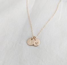 Each tiny charm measures 3/8" (9.5mm). One is personalized with a tiny heart design, the other, an initial of your choice. Available in solid .925 sterling silver or 14k gold fill. Material and chain length can be made from the drop down menu. Please leave me a note in the personalization box with the initial you would like. Necklace With Heart, Tiny Charm, Baby Footprints, Tiny Heart, Initial Charm, Charm Gift, Initial Necklace, Heart Design, Solid 925 Sterling Silver