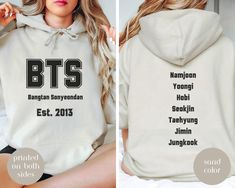 BTS Bangtan Hoodie Sweatshirt, Kpop Gildan 18500 Hooded Sweatshirt, gift for army BTS fan, Namjoon, Jungkook, Yoongi, Jin, Taehyung, Hobi So soft and comfy BTS Bangtan Hooded Gildan 18500 Sweatshirt! Printed on front and back! Backside has members names. Great hoodie for you or gift for a fellow Army!  Whether you're hitting the gym, running errands, or just lounging at home, our BTS sweatshirt is perfect! Kangaroo pouch pocket will always keep your hands warm!  Stay cozy while you wait for thei Kpop Style Hoodie With Letter Print, Kpop Cotton Hoodie With Letter Print, Kpop Style Cotton Hoodie With Letter Print, Kpop Hoodie With Letter Print For Fall, Kpop Style Hoodie With Letter Print For Fall, Army Bts, Bts Fans, Kangaroo Pouch, Jimin Jungkook