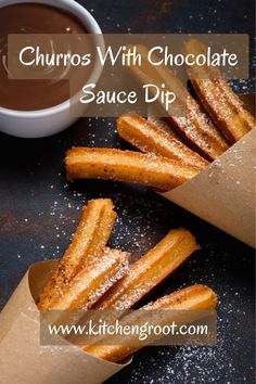 churros with chocolate sauce dip on a table next to a cup of coffee