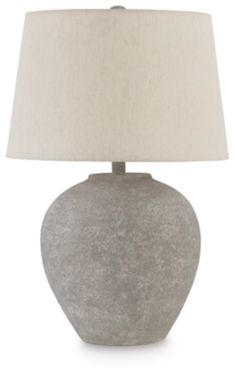 a gray table lamp with a white shade