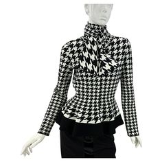 Alexander McQueen Houndstooth Pattern Knit Top Cardigan - Statement Piece! One of the Most Timeless Iconic Pattern in Fashion! Italian size - L ( please check measurements ). Famous Alexander McQueen Houndstooth Print, Attached on Back Scarf Can be Worn in Different Ways. Peplum Style Waistline, Hidden Button Closure., Stretchy. 49% Wool, 33% Rayon, 13% Poly, 3% Nylon, 2% Elastane. Measurements: Length - 24 inches, Bust - 34", Waist - 28/30", Sleeve - 24.5". Made in Italy. Excellent condition. Chic Houndstooth Winter Tops, Fitted Houndstooth Pattern Tops For Winter, Fitted Houndstooth Tops For Winter, Peplum Styles, Houndstooth Pattern, Clothing Hacks, White Outfits, Cardigan Tops, Fashion Classy