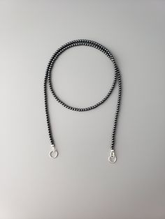 "These are 2mm round smooth black Hematite beads. Sterling silver metal. Outside diameter of the rings is 7mm, inside is approx 5,5mm. The length is 18\". If you need different length (15\"-24\") please leave  a note at the checkout or contact me. All items are strung on the high quality stringing wire.  Carabiner necklaces  https://www.etsy.com/shop/CrystalRise?search_query=Carabiner Hematite jewelry  https://www.etsy.com/shop/CrystalRise?search_query=Hematite Link to the shop  https://www.etsy.com/shop/CrystalRise" Sapphire Necklace Gold, Carabiner Necklace, Pyrite Bracelet, Hematite Jewelry, Malachite Earrings, Blue Sapphire Necklace, San Juan Capistrano, Azurite Malachite, Agate Earrings