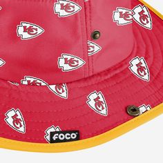 With this Kansas City Chiefs Women's Mini Print Hybrid Boonie Hat on your head, you're sure to be the tailgate's coolest fan, both in terms of temperature and style. Features All-over, team-colored design so you can rep the team in style Repeat team logo display, in case there were any doubts where your allegiances lie Fastening snap buttons on sides so you can switch up your style Wide brim, versatile outdoor hat to keep you cool and comfortable Details Material: Polyester Officially licensed I Adjustable Hats For Fan Merchandise With Team Spirit, Sports Fan Cap For Tailgating, Sports Fan Trucker Hat With Visor, Sports Fan Visor Hat For Game Day, Adjustable Fan Merchandise Hat, Sports Fan Hats For Football Season Game Day, Red Sports Fan Hats For Game Day, Red Sports Fan Hat, Game Day Football Season Sports Fan Hat